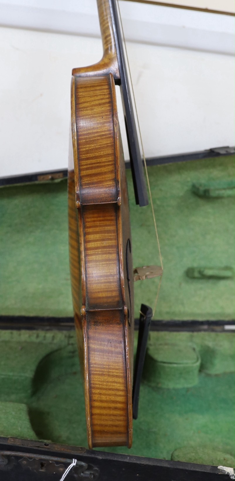 A cased German violin, 60cms long